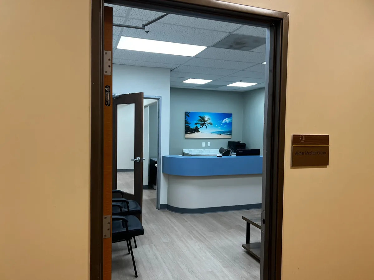 Reception desk viewed from the entrance at Afshar Medical Group in Irvine