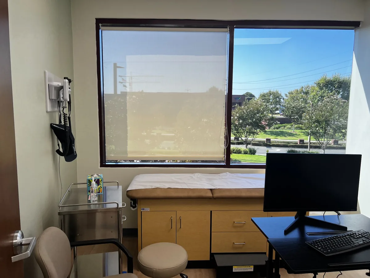 Exam room with exam table and computer at Afshar Medical Group, Irvine